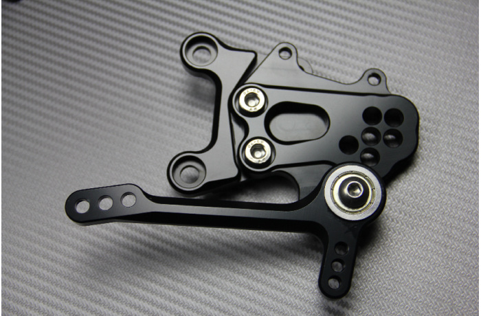 Estriberas retrasadas regulables APRILIA RSV4 / Tuono V4 1000 / 1100 2009 - 2020
