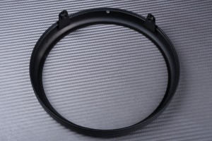 Casing for round headlight casing, to be adapted