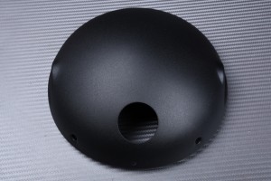 Casing for round headlight casing, to be adapted
