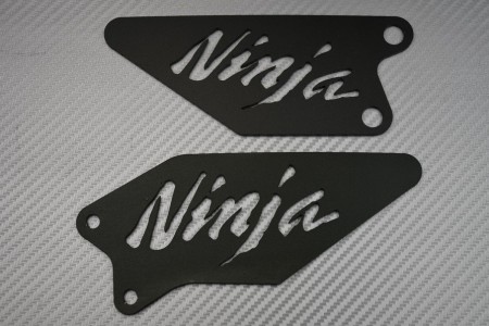 Pareja de taloneras de estriberas KAWASAKI - con sigla NINJA