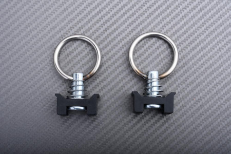 Anillos de fijación para el carril de anclaje de transporte