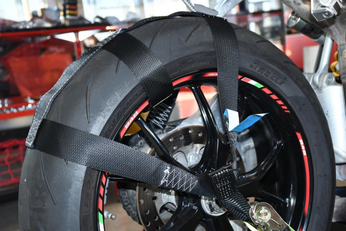 Rear wheel tie down sling