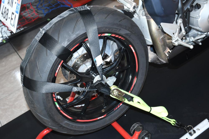 Rear wheel tie down sling