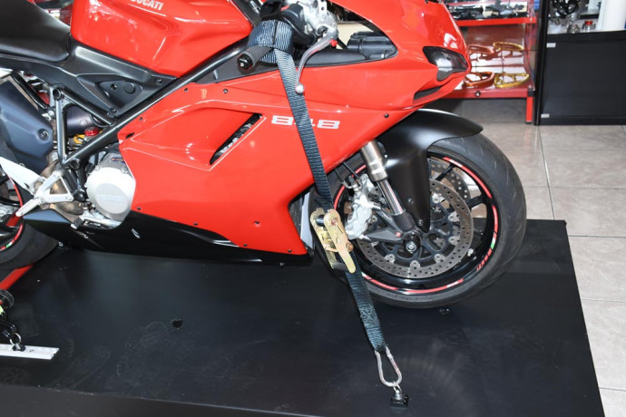 Handlebar tie down sling with carabiner and ratchet Handlebar tie down sling with carabiner and ratchet