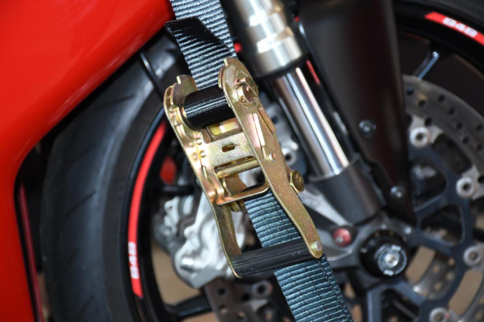 Handlebar tie down sling with carabiner and ratchet Handlebar tie down sling with carabiner and ratchet