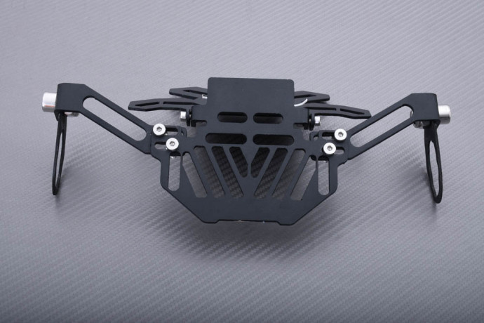 Portamatrícula universal reclinable